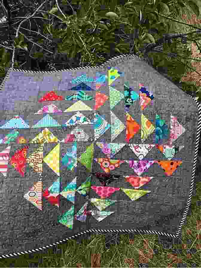 A Modern Wall Hanging Featuring Flying Geese Blocks Just One Charm Pack Quilts: Bust Your Precut Stash With 18 Projects In 2 Colorways