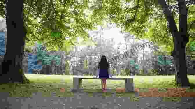 Grieving Mother Sitting Alone On A Bench, Surrounded By Nature. LETTERS FROM BEYOND: GRIEVING MOTHER FINDS SOLACE IN OWN WORDS