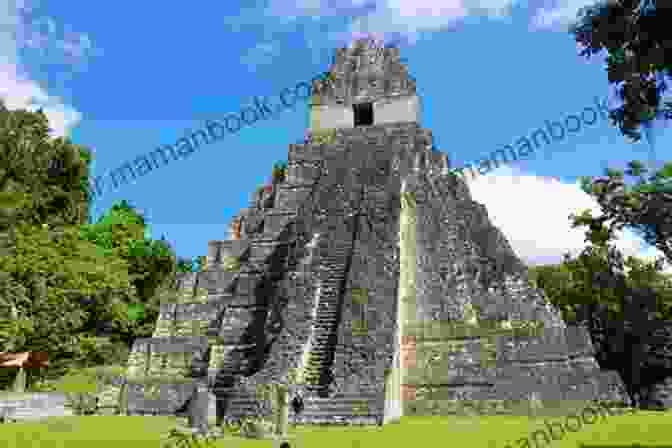 The Majestic Ruins Of Tikal, With Towering Pyramids And Intricate Carvings, Nestled Amidst The Rainforest Maya History: A Captivating Guide To The Maya Civilization Culture Mythology And The Maya Peoples Impact On Mesoamerican History (Captivating History)